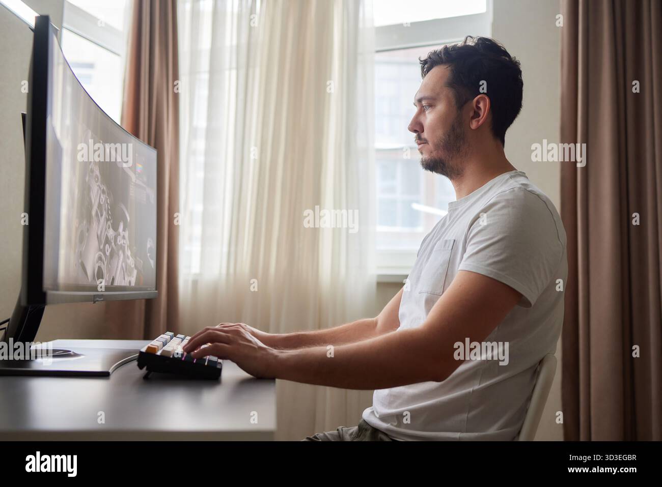 Designer Editing Photo On Computer In Office Stock Photo