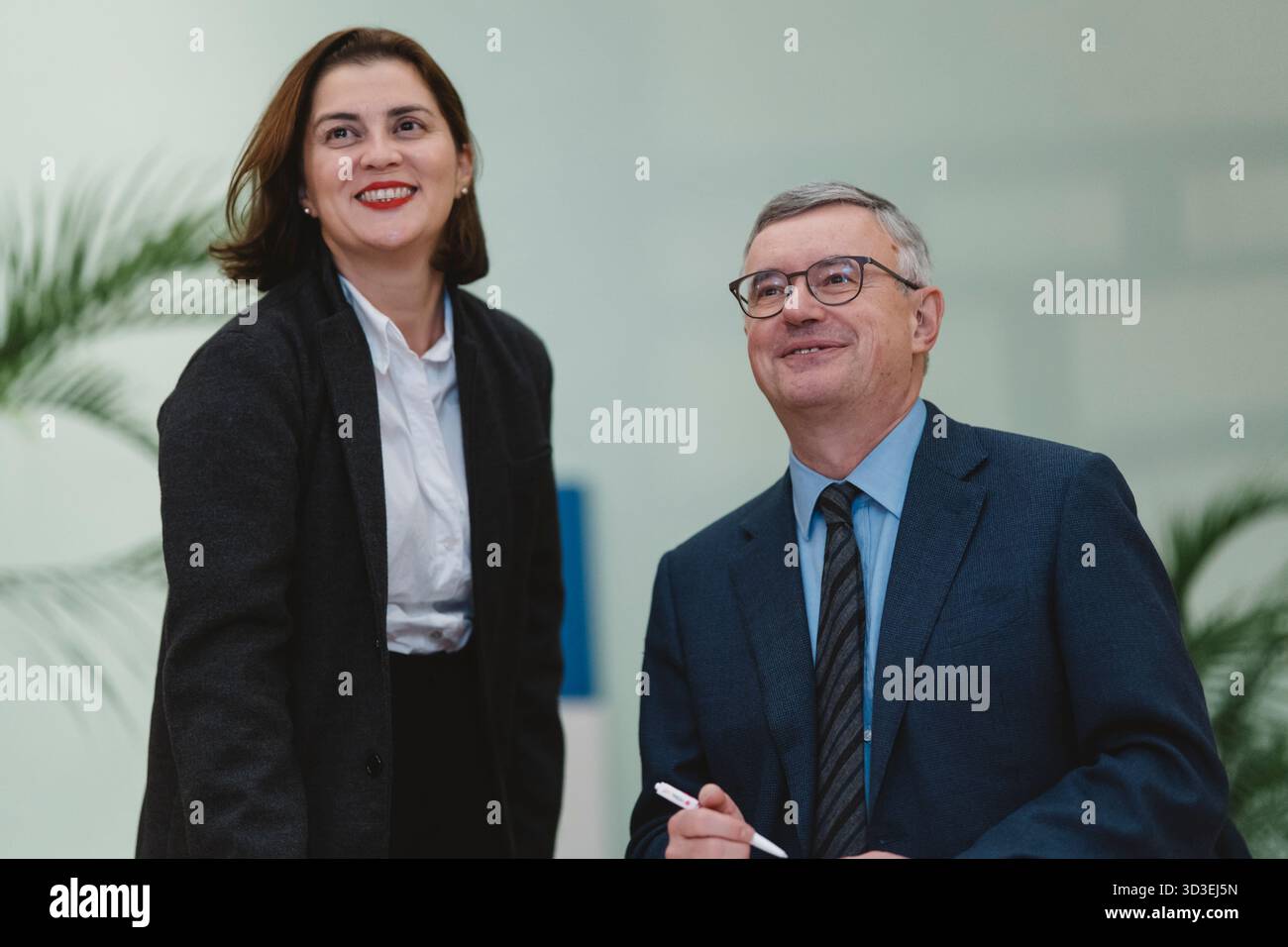 Catanzaro, Italy. 04th Nov, 2025. Alessandro Barbero (R) poses for a photo with a fan during the books signature. Alessandro Barbero, one of the most well known Italian historian, presented his new book “S. Francesco”, about multiple versions on the life of S. Francis of Assisi, in Politeama theatre in Catanzaro, with mayor Nicola Fiorita and Gaetano Laterza of the publishing house. Credit: SOPA Images Limited/Alamy Live News Stock Photo