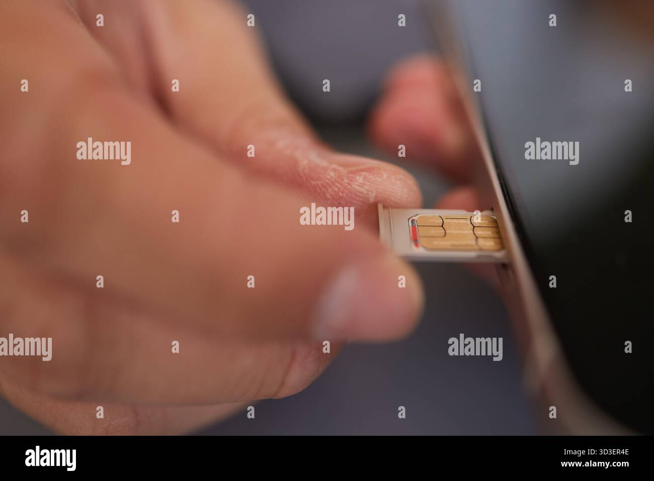 SIM card replacement in the phone Stock Photo