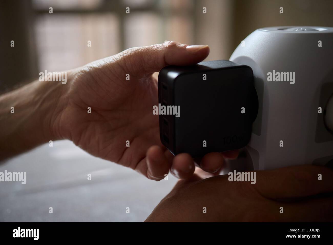 Charging devices that feature multiple ports and connectors for versatile connectivity Stock Photo