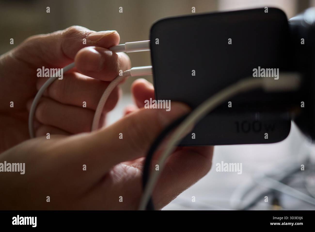 Charging devices that feature multiple ports and connectors for versatile connectivity Stock Photo