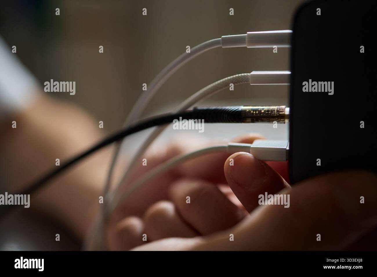 Charging devices that feature multiple ports and connectors for versatile connectivity Stock Photo
