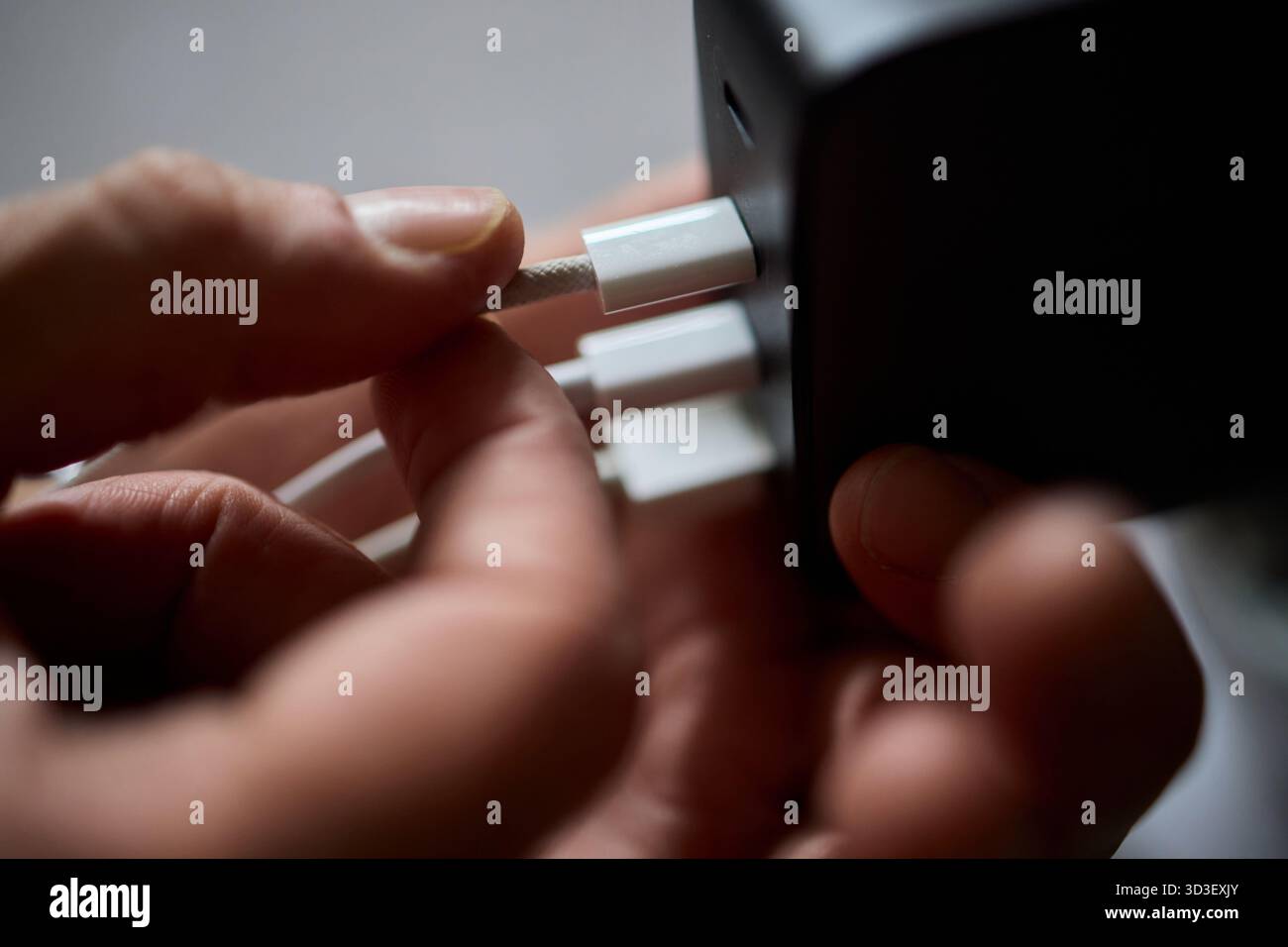 Charging devices that feature multiple ports and connectors for versatile connectivity Stock Photo