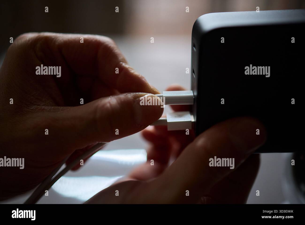 Charging devices that feature multiple ports and connectors for versatile connectivity Stock Photo