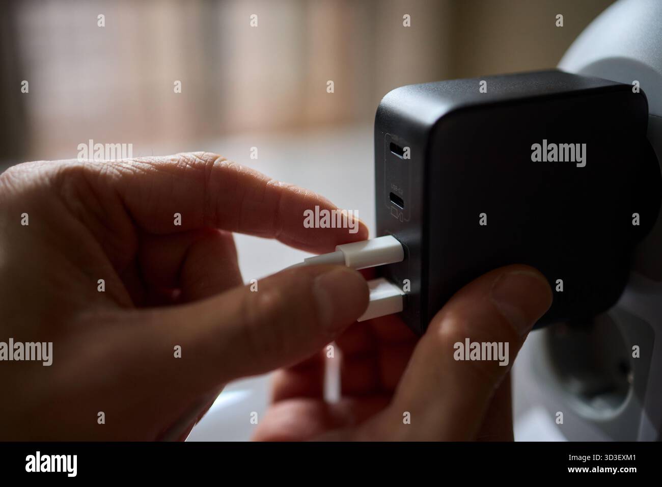 Charging devices that feature multiple ports and connectors for versatile connectivity Stock Photo