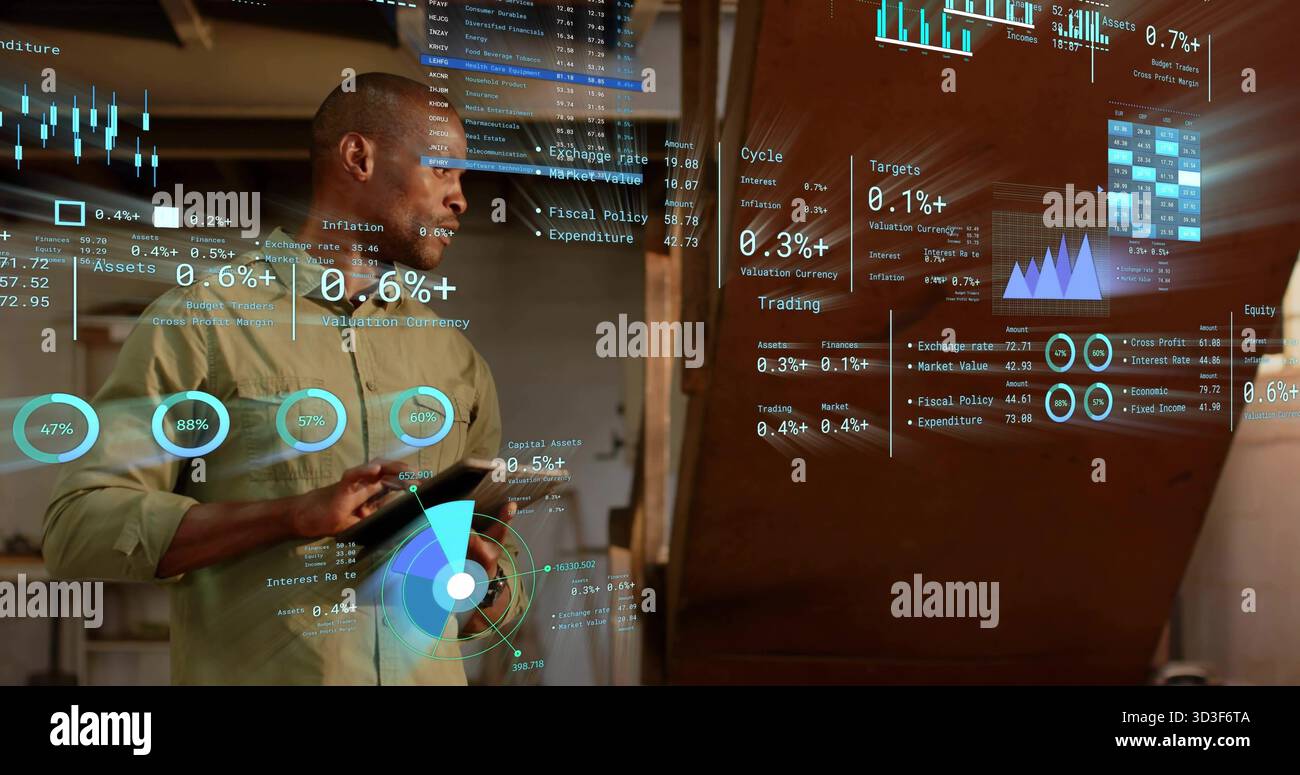 Analyzing data, analyst holding tablet in rustic office displaying holographic charts, copy space Stock Photo