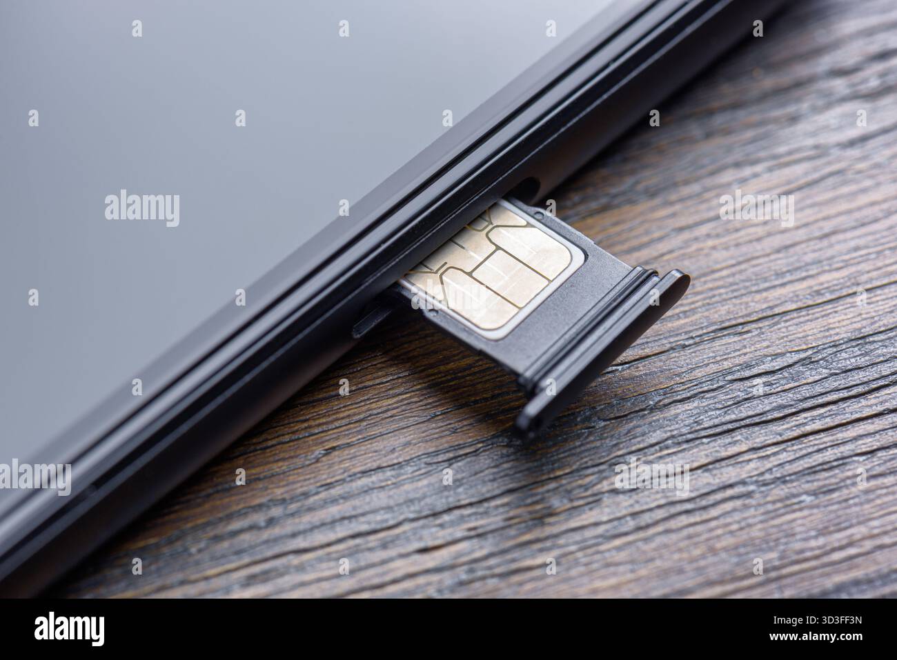 Inserting Modern Nano Sim Hi res Stock Photography And Images Alamy