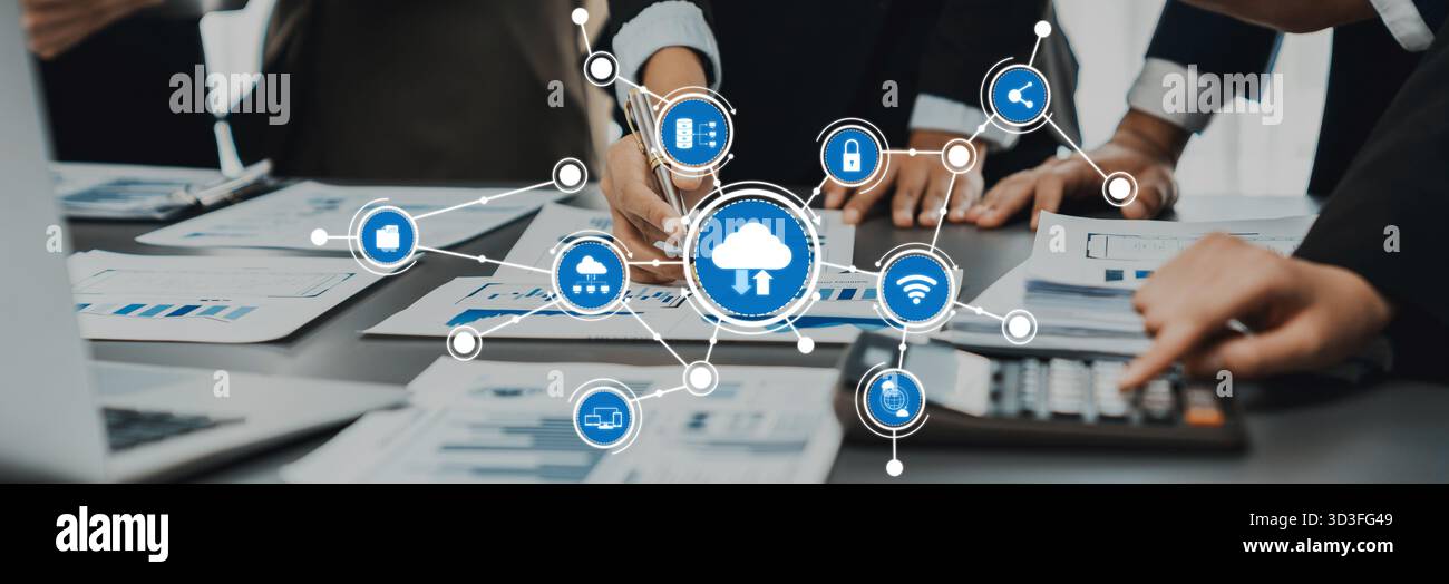 A dynamic office scene showcasing a team collaborating on cloud computing technology, working together on data analysis and innovative solutions in a Stock Photo
