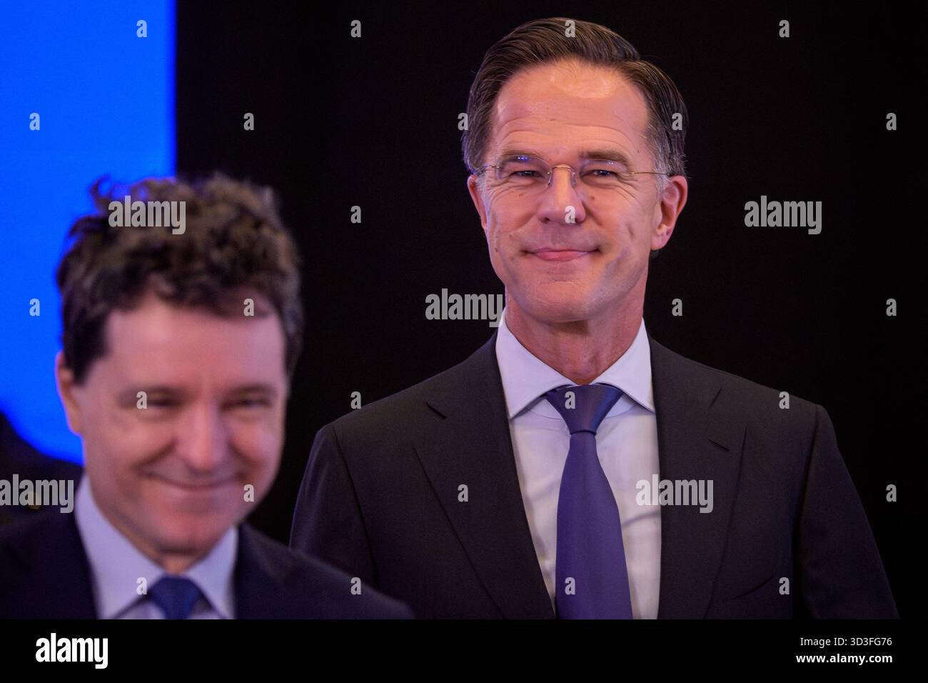 NATO Secretary General Mark Rutte, right, arrives with Romanian ...