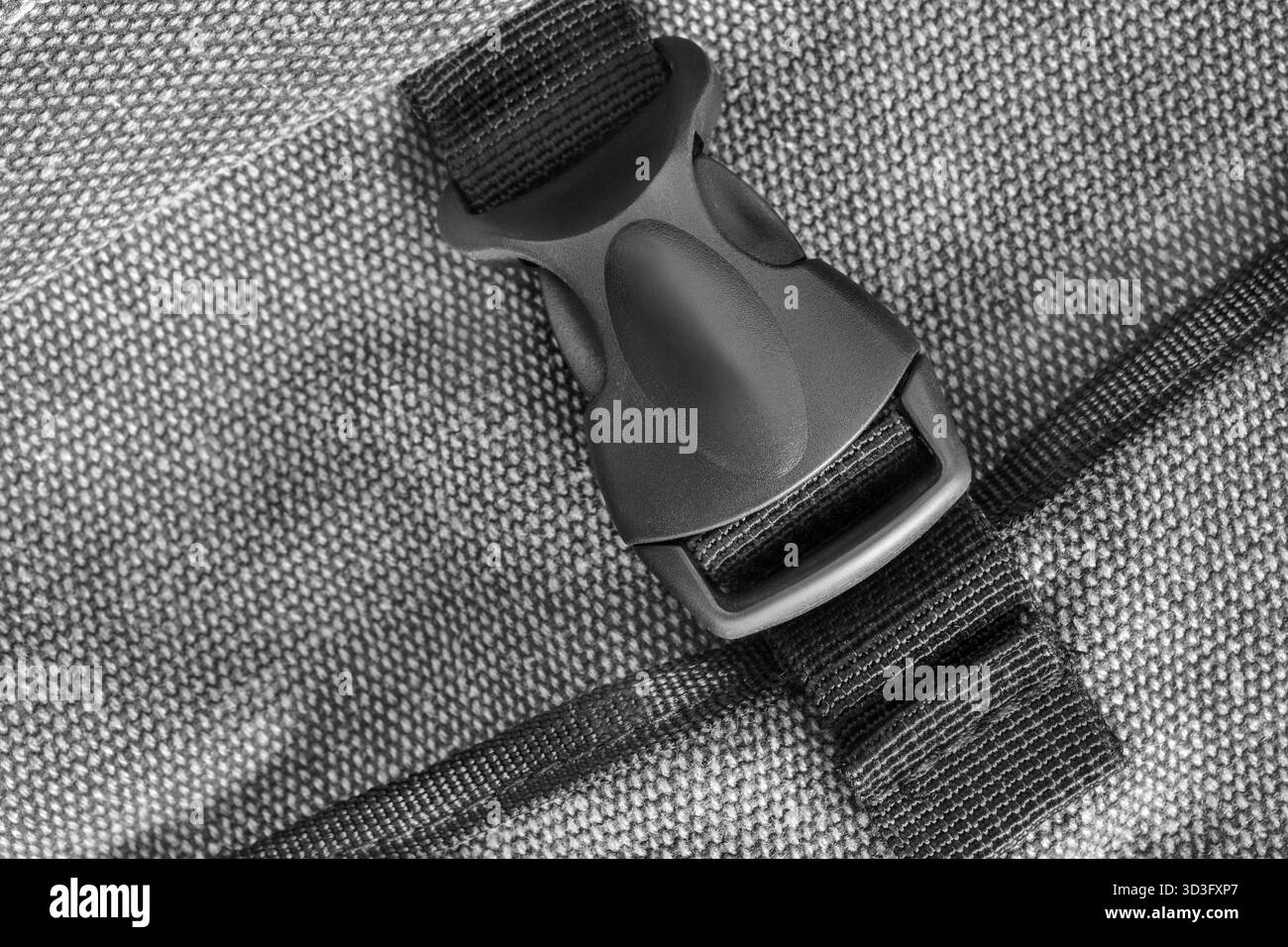 Canvas grey bag black plastic fastex lock closeup Stock Photo