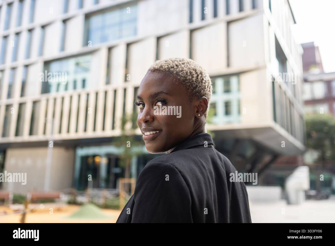 Businesswoman in black blazer hi-res stock photography and images - Alamy
