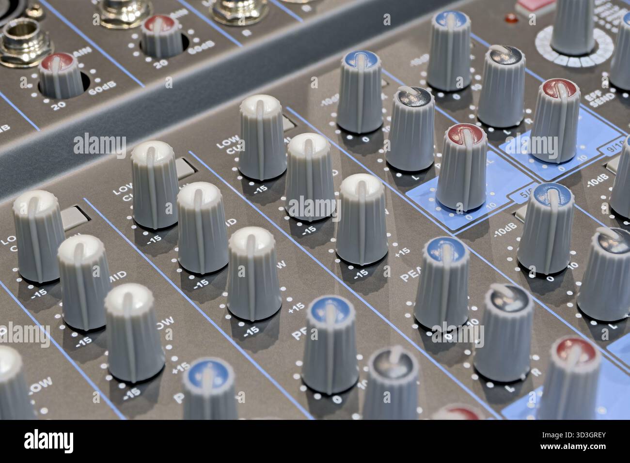 Generic audio mixing console, close up shot, abstract technology background Stock Photo