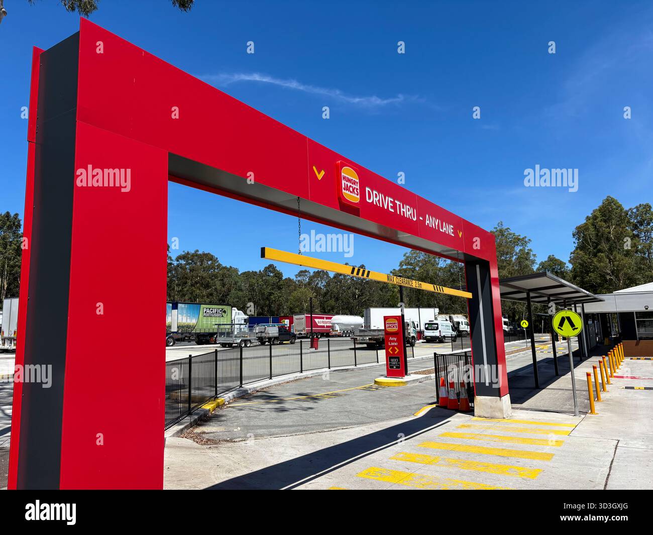 Hungry Jacks fast food restaurant, drive thru entrance for ordering and collecting food meal, New South Wales,Australia - Smartphone Captured Stock Image