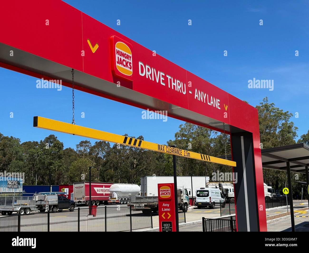 Hungry Jacks fast food restaurant, drive thru entrance for ordering and collecting food meal, New South Wales,Australia - Smartphone Captured Stock Image