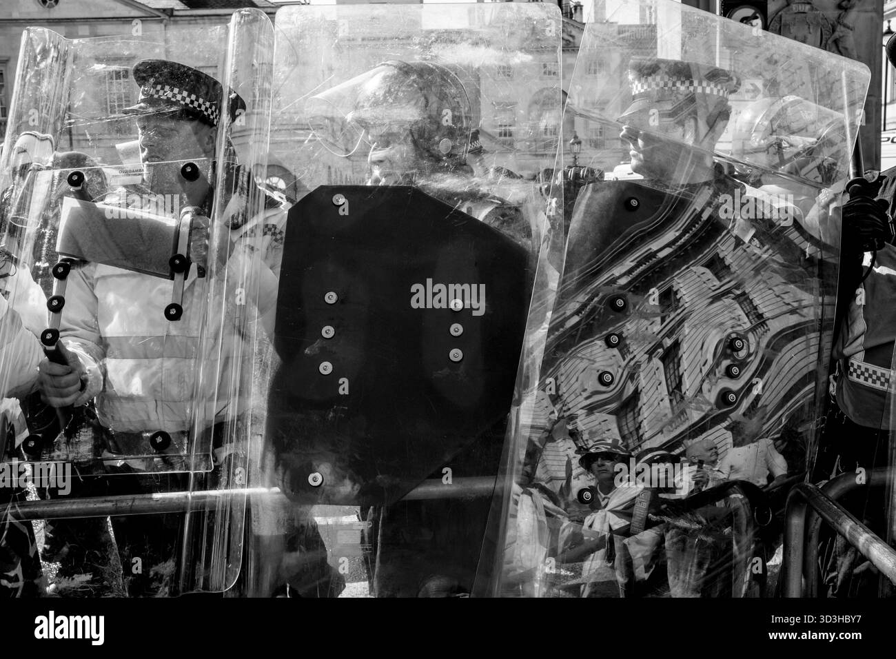 Metropolitan Police Officers Stand Behind Riot Shields Preventing ...