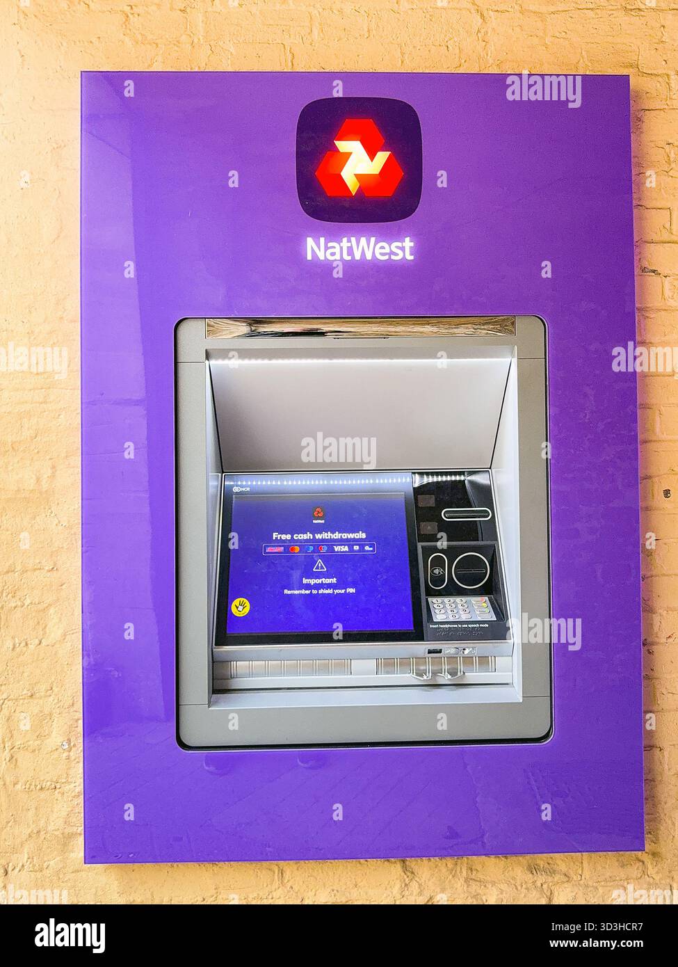 Woodstock, Oxfordshire, England, UK - 8 October 2025: ATM cashpoint machine in the wall of a building in the town of Woodstock - Smartphone Captured Stock Image