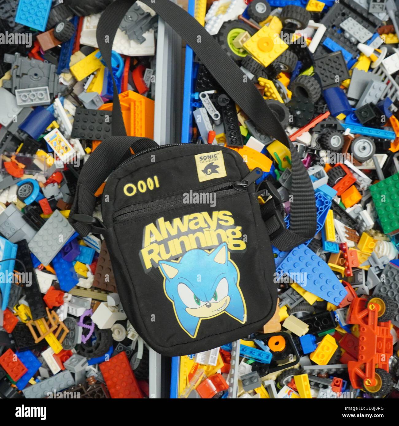 A book laying on Lego bricks Stock Photo