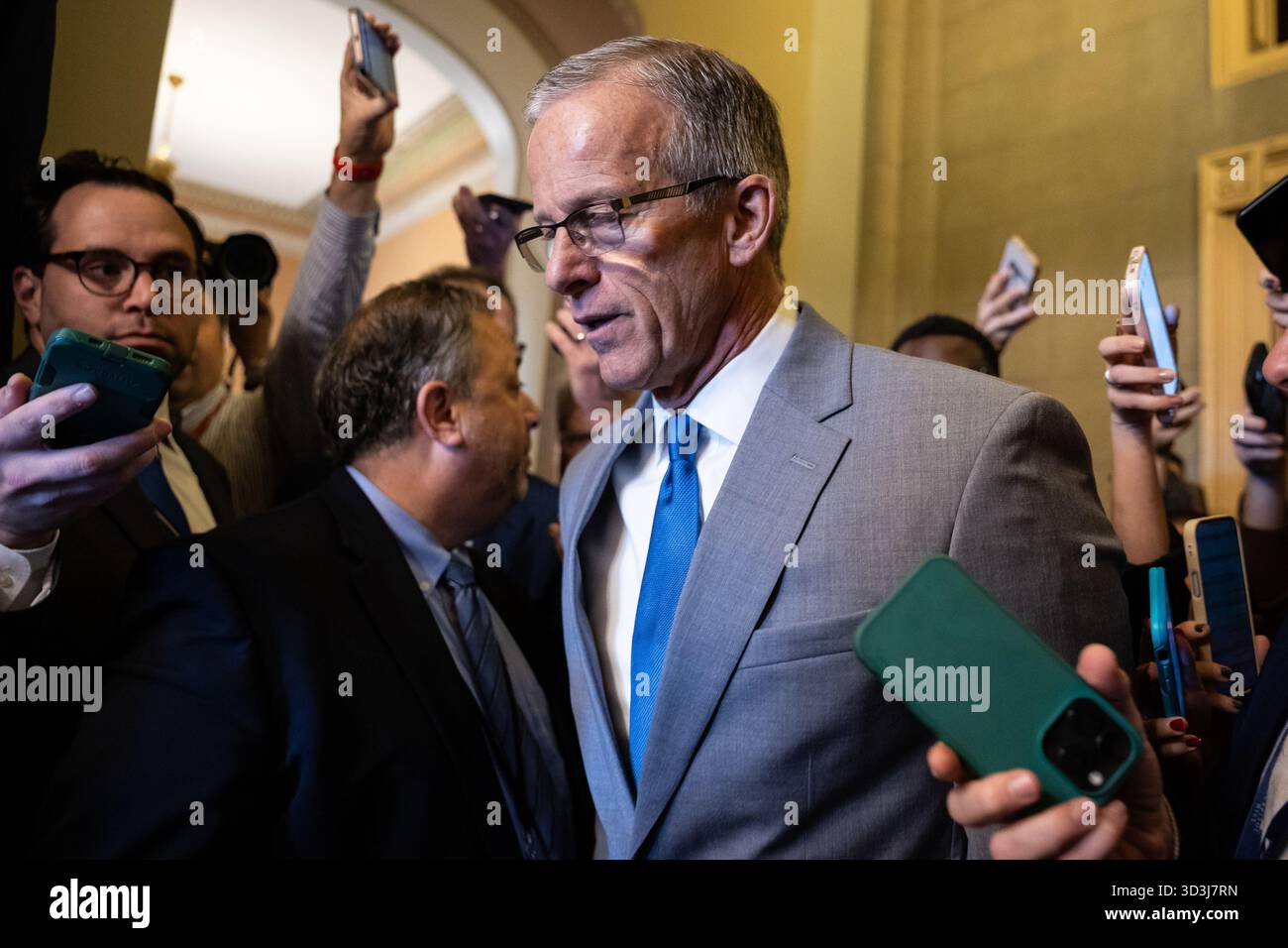 Senate Majority Leader John Thune (R-S.D.) speaks with reporters as he ...