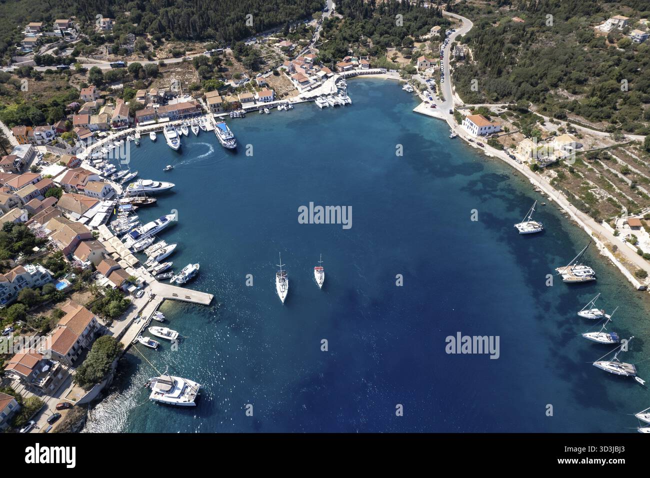 Drone aerial scenery of Greek harbour village of Fiskardo on the ...