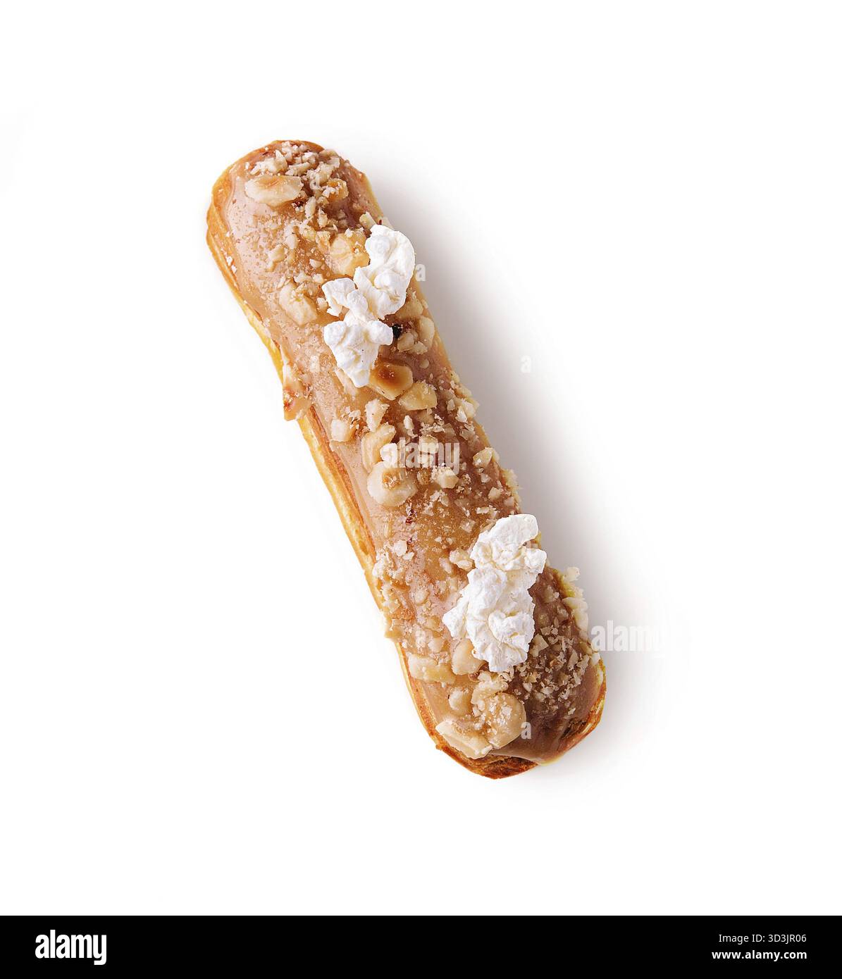 Food, Eclair with caramel and nuts on white Stock Photo