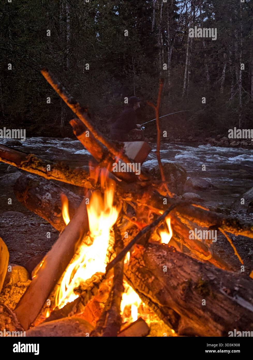 Campfire at Night, A river runs through it - Smartphone Captured Stock Image