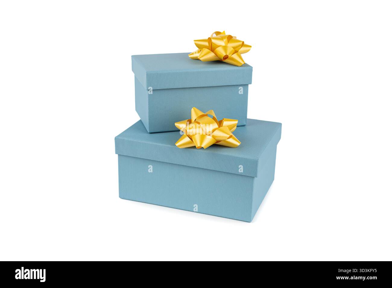Two blue gift boxes with yellow ribbons on white background. Stock Photo
