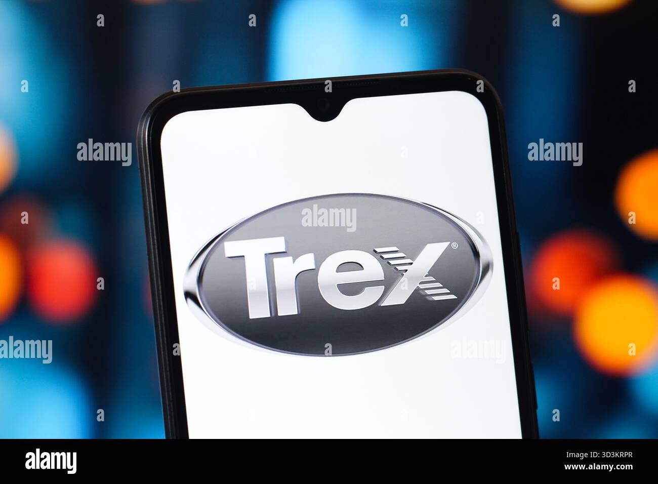In this photo illustration, the Trex Company logo is seen displayed on a smartphone screen. Stock Photo