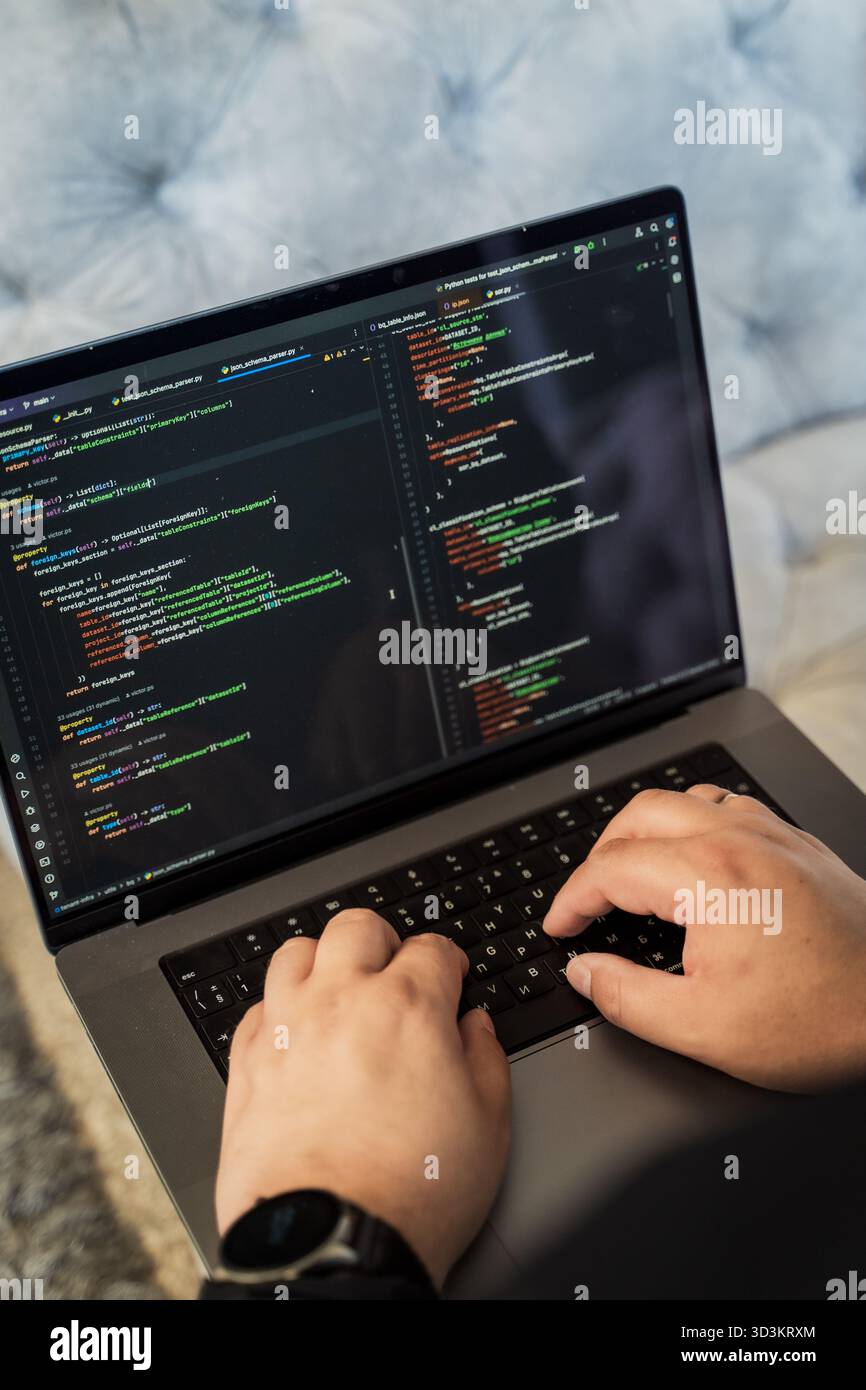 Programming language concept. Programmer profession - writing programming code on laptop Stock Photo