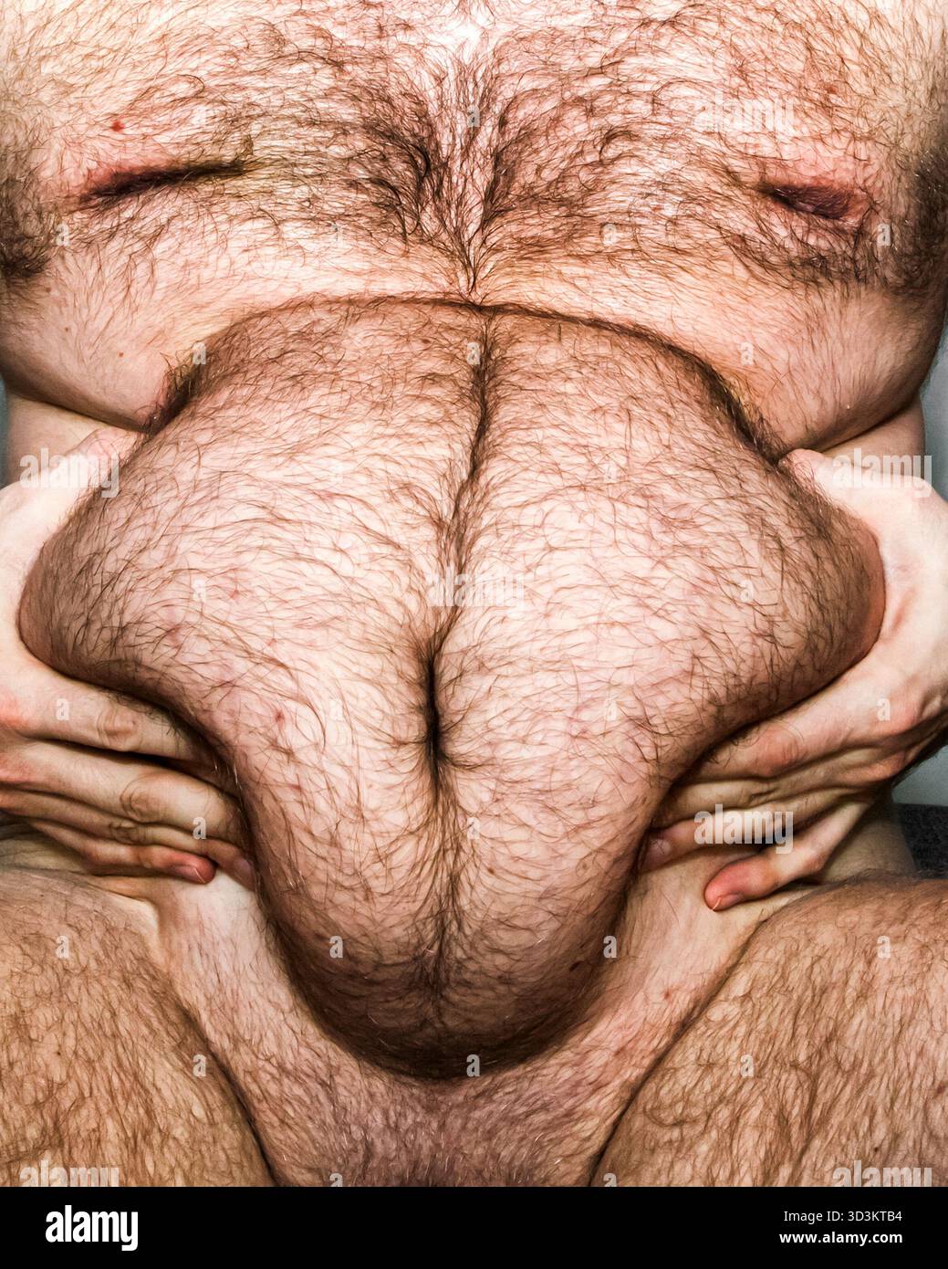 Close up of overweight male body with excessive belly fat and skin folds, symbolizing obesity, poor nutrition, health risks and modern sedentary lifes Stock Photo
