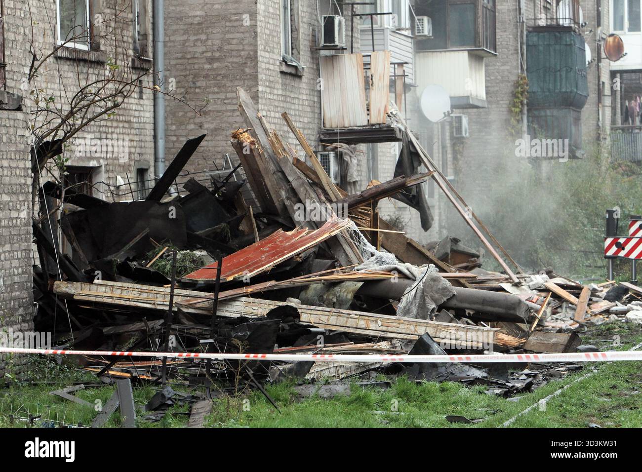 Construction debris lies in the courtyard of a four-storey residential building damaged in a Russian drone attack in the city of Kamianske, Dnipropetrovsk region, Ukraine, on November 6, 2025 (Photo by Mykola Miakshykov/Ukrinform) Stock Photo