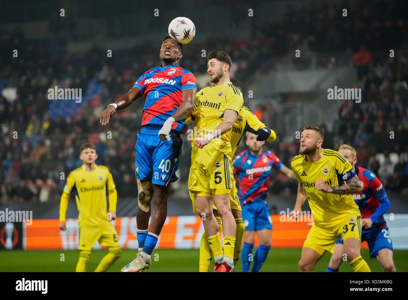 plzen-s-sampson-dweh-left-heads-the-ball-past-fenerbahce-s-ismail