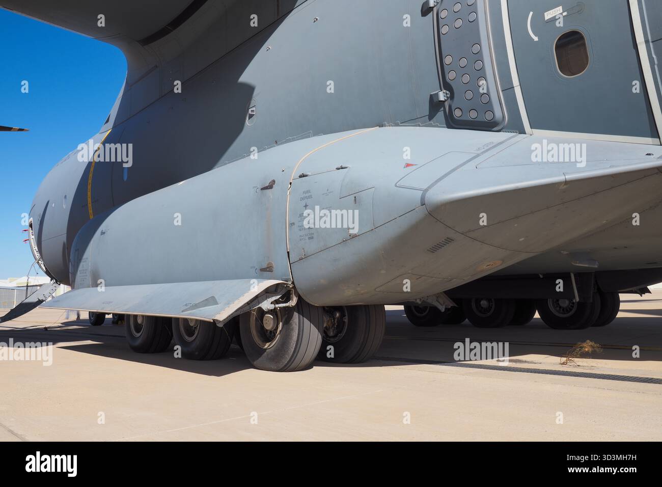 Main landing gear of military cargo aircraft Stock Photo - Alamy