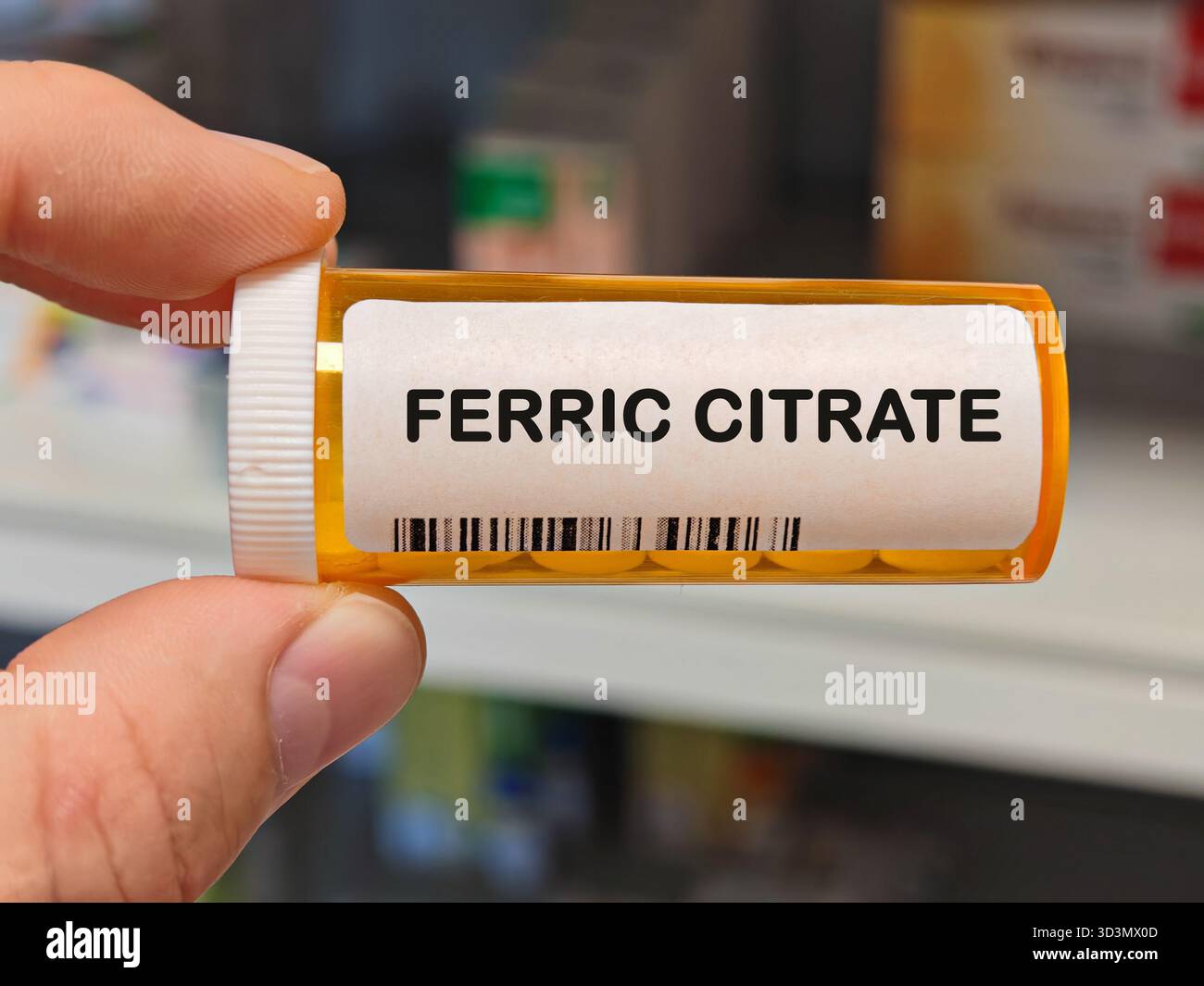 orange plastic Box of FERRIC CITRATE tablets on a hospital pharmacy ...