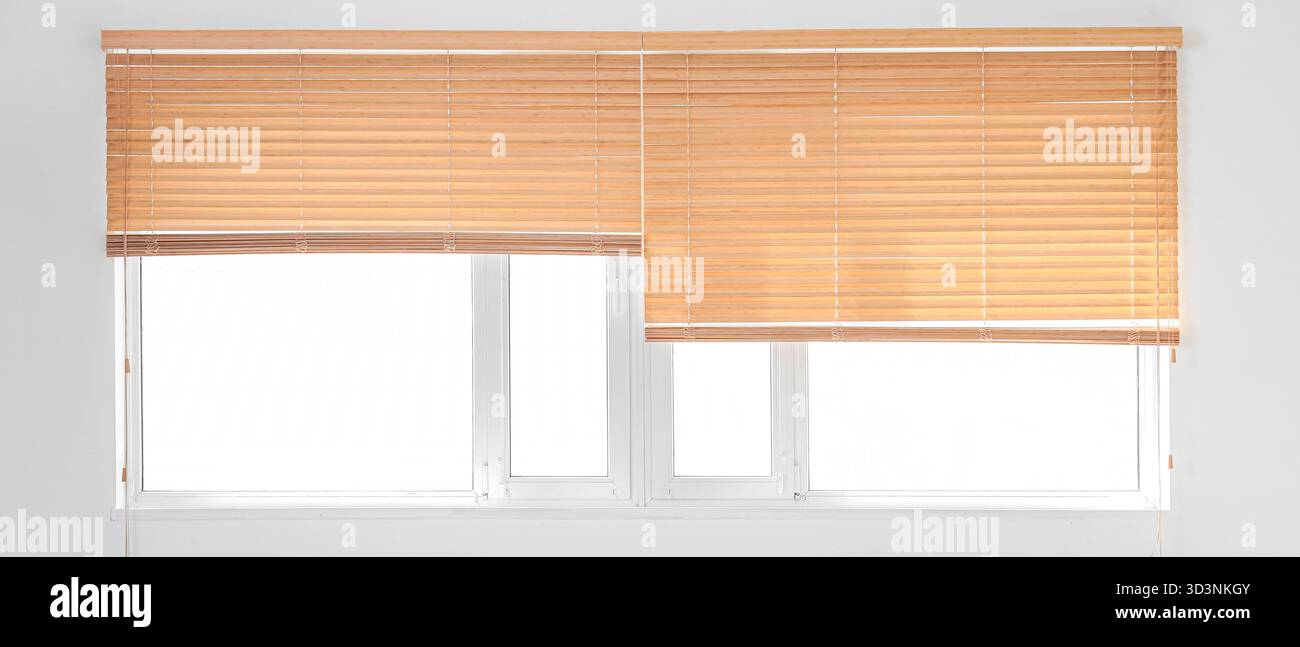 Big window with blinds in room Stock Photo