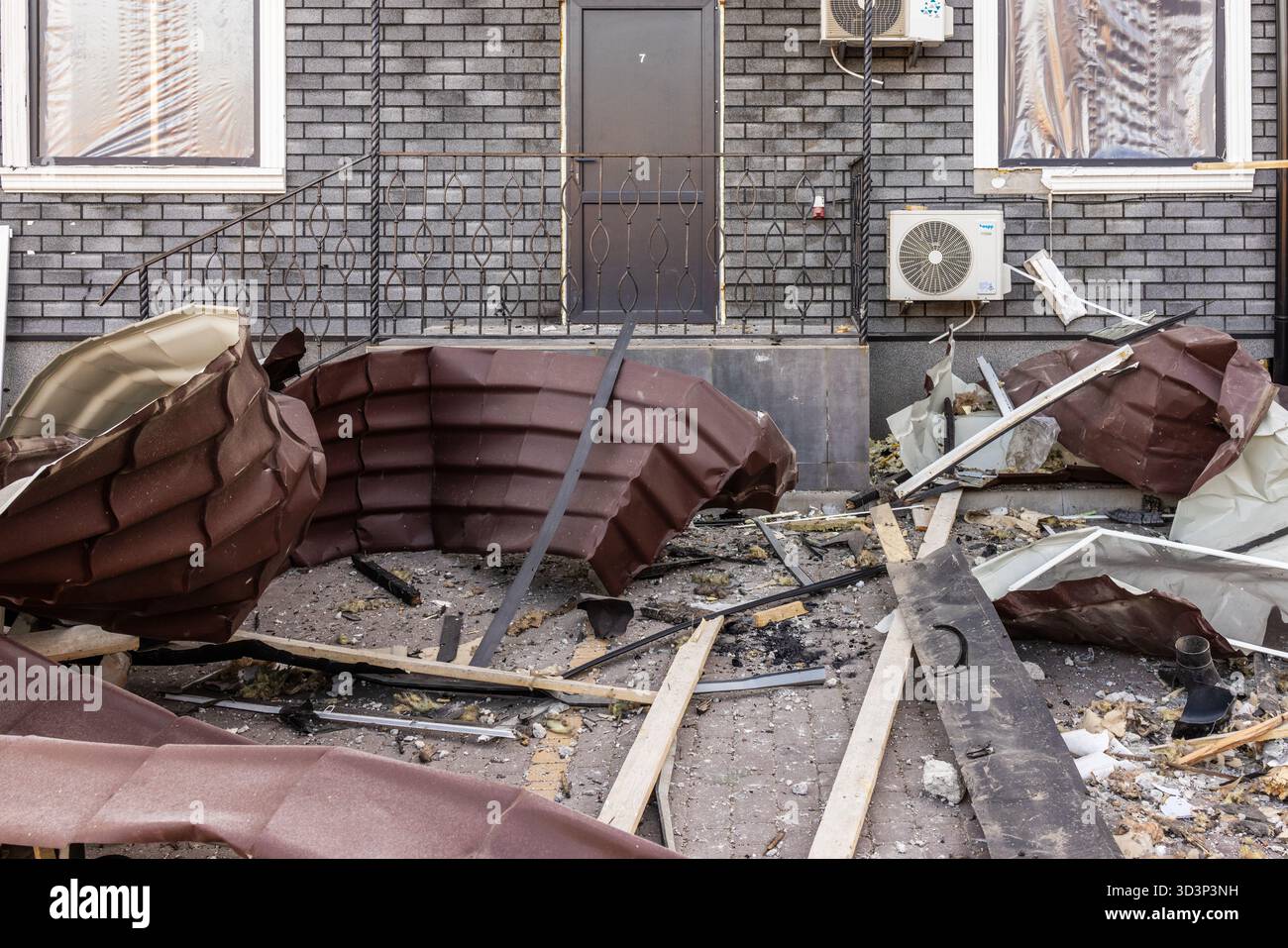 Structural Damage School Ground level view of structural damage collapsed roofing and scattered ...