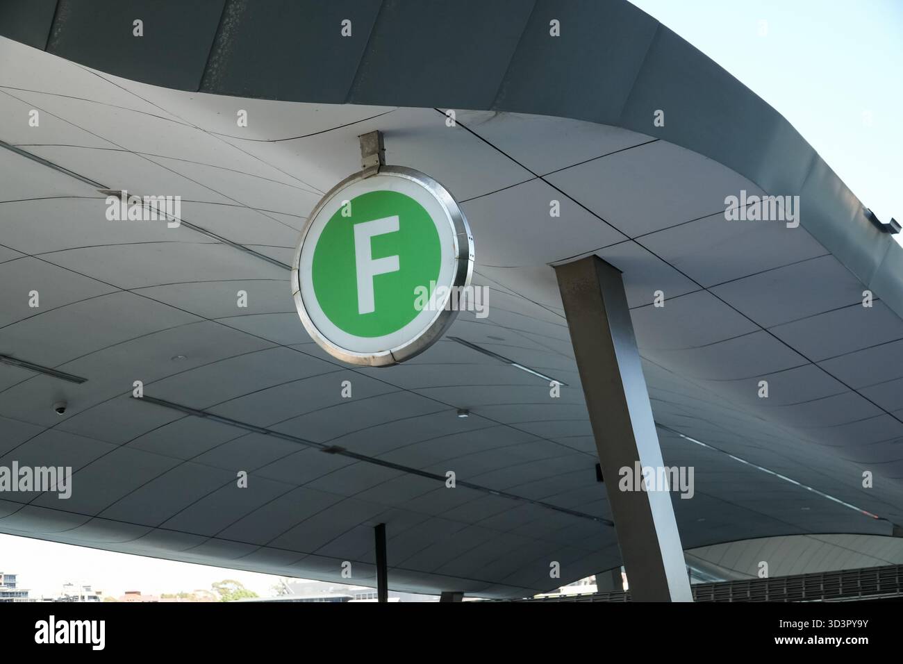 Fs Inlet. Sign Ferry terminal sign with a green circular 'F' symbol, suspended from a ...