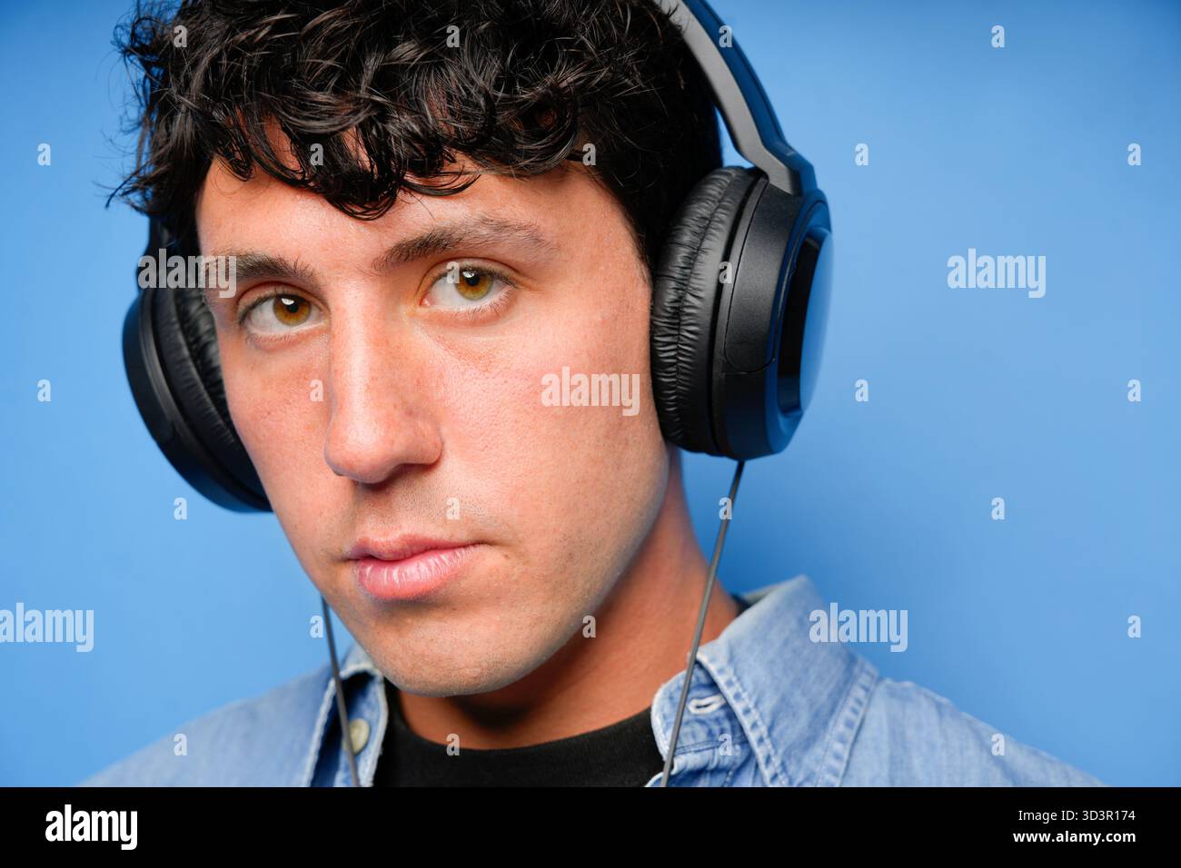 Person curly hair wearing denim hi-res stock photography and images - Alamy