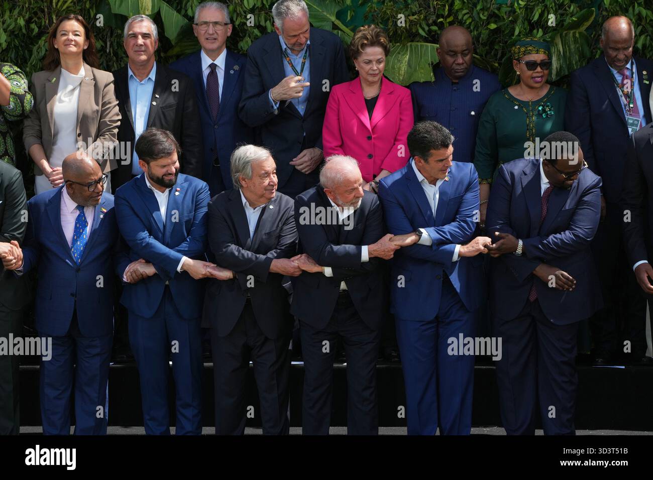 Leaders attending the COP30 U.N. Climate Summit prepare for a group ...
