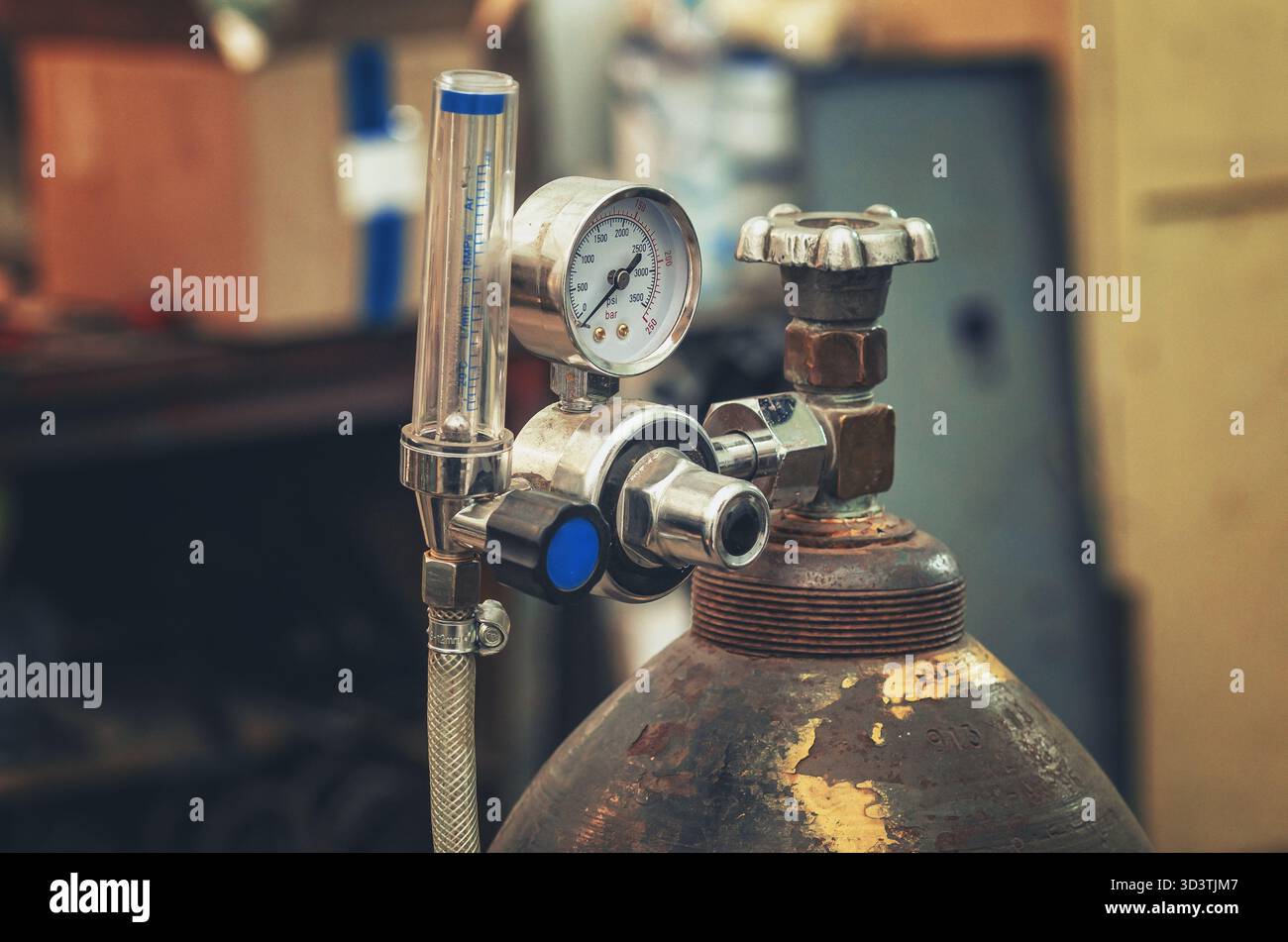 Gas cylinder pressure gauge. Valve on oxygen cylinder. Cylinder with