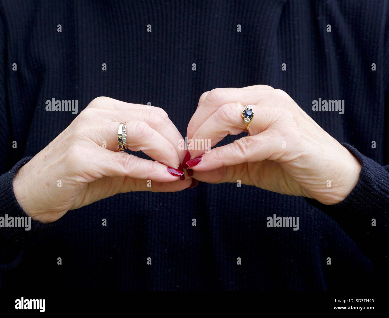 A pair of hands signing the consonant letter 'B' in British Sign ...