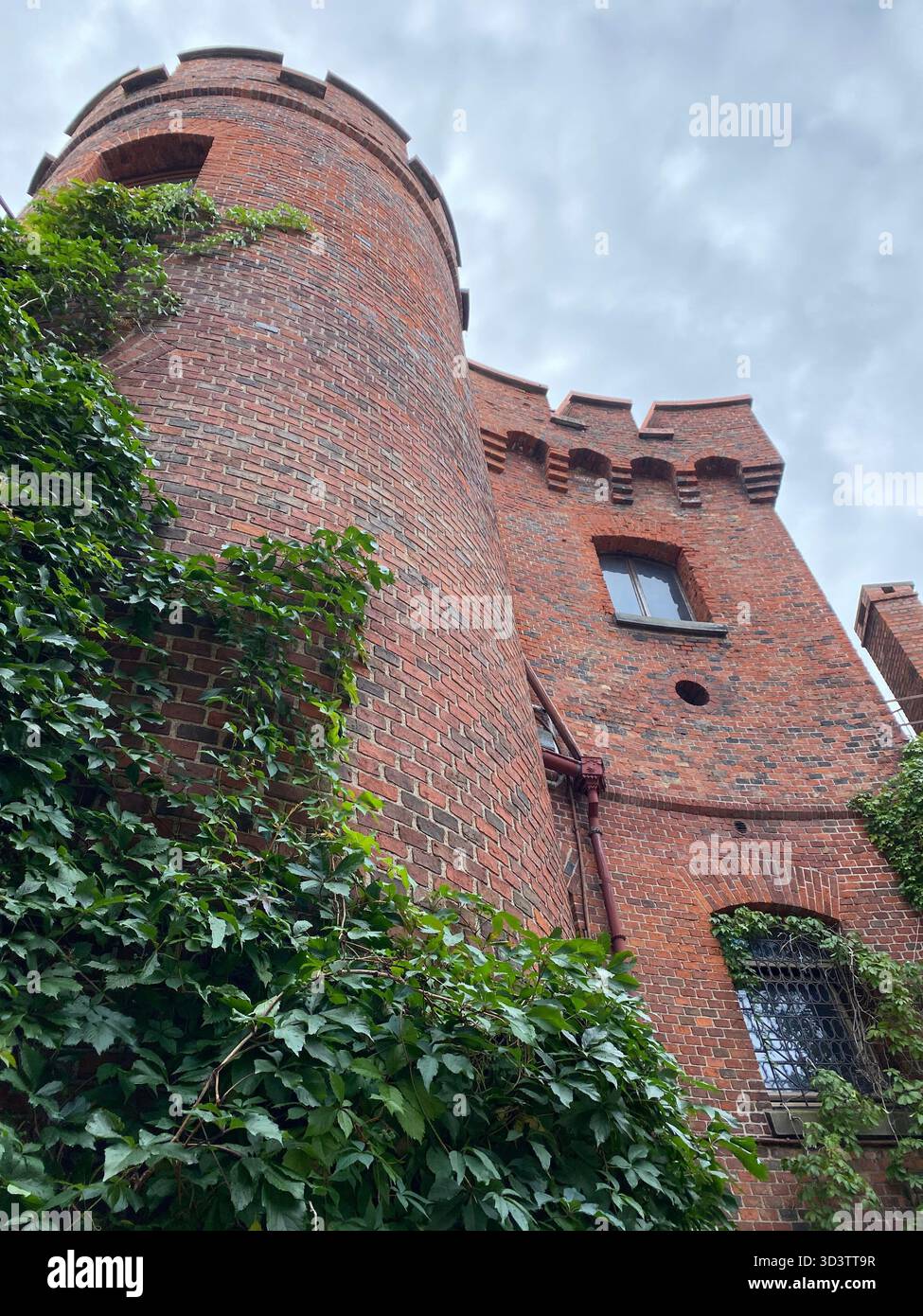 An Upward Vertical View Of The Dohna Tower A Red Brick 19th century an-upward-vertical-view-of-the-dohna-tower-a-red-brick-19th-century