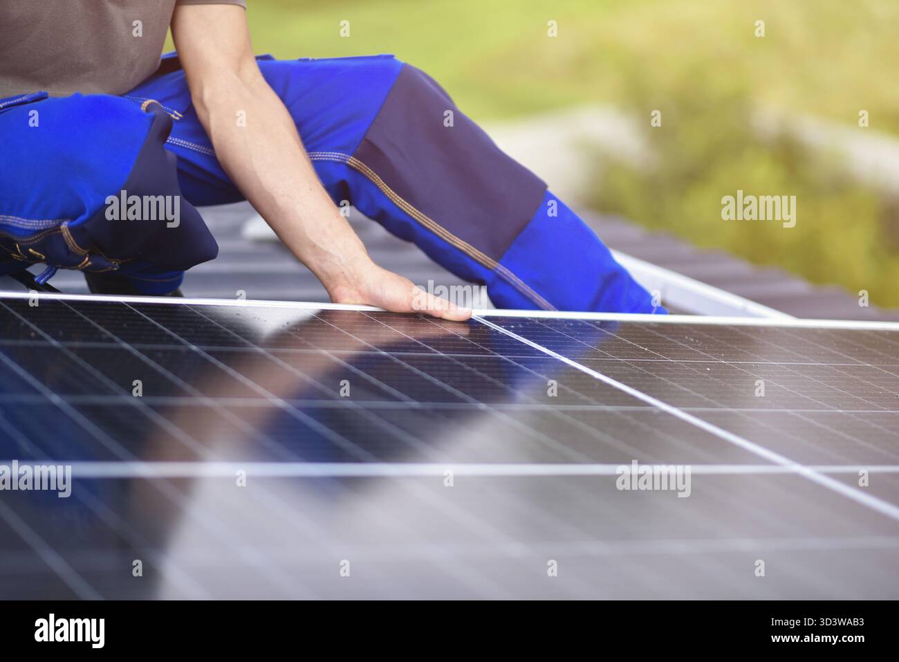 Rooftop solar power system. Process of installing solar panels on the ...
