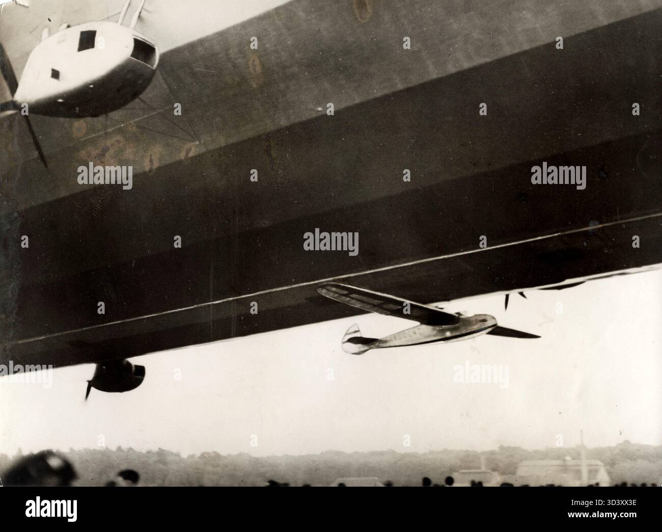 A 1934 photo showing the moment when German pilot Wiegmeyer's glider ...