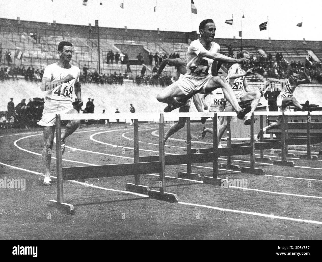 A snapshot from the 1928 Olympics showing the 400-meter hurdles event ...