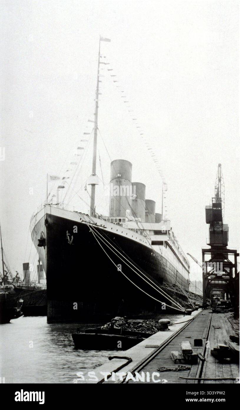 the-white-star-line-s-rms-titanic-is-docked-at-a-quay-with-cranes-in