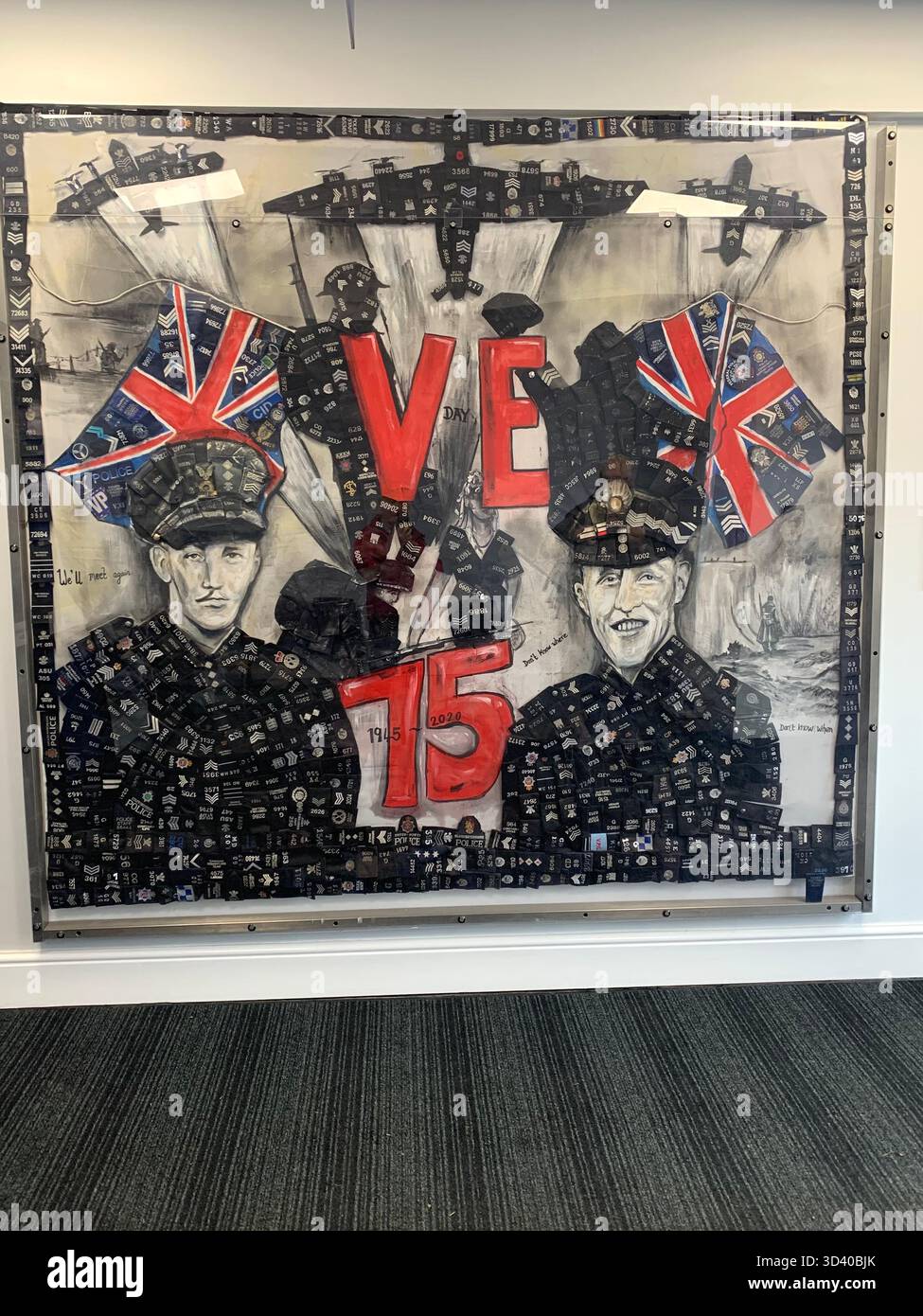 VE day soldiers died killed in action first world war Second world war uniforms aircraft planes plane British helmets poppy day flag flags attack - Smartphone Captured Stock Image