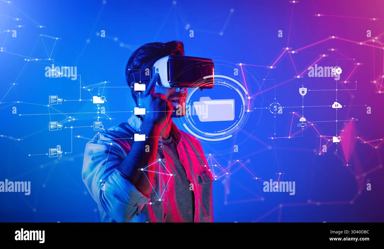Explore a captivating virtual reality scene showcasing a user interacting with digital data management concepts against a vibrant blue and pink Stock Photo