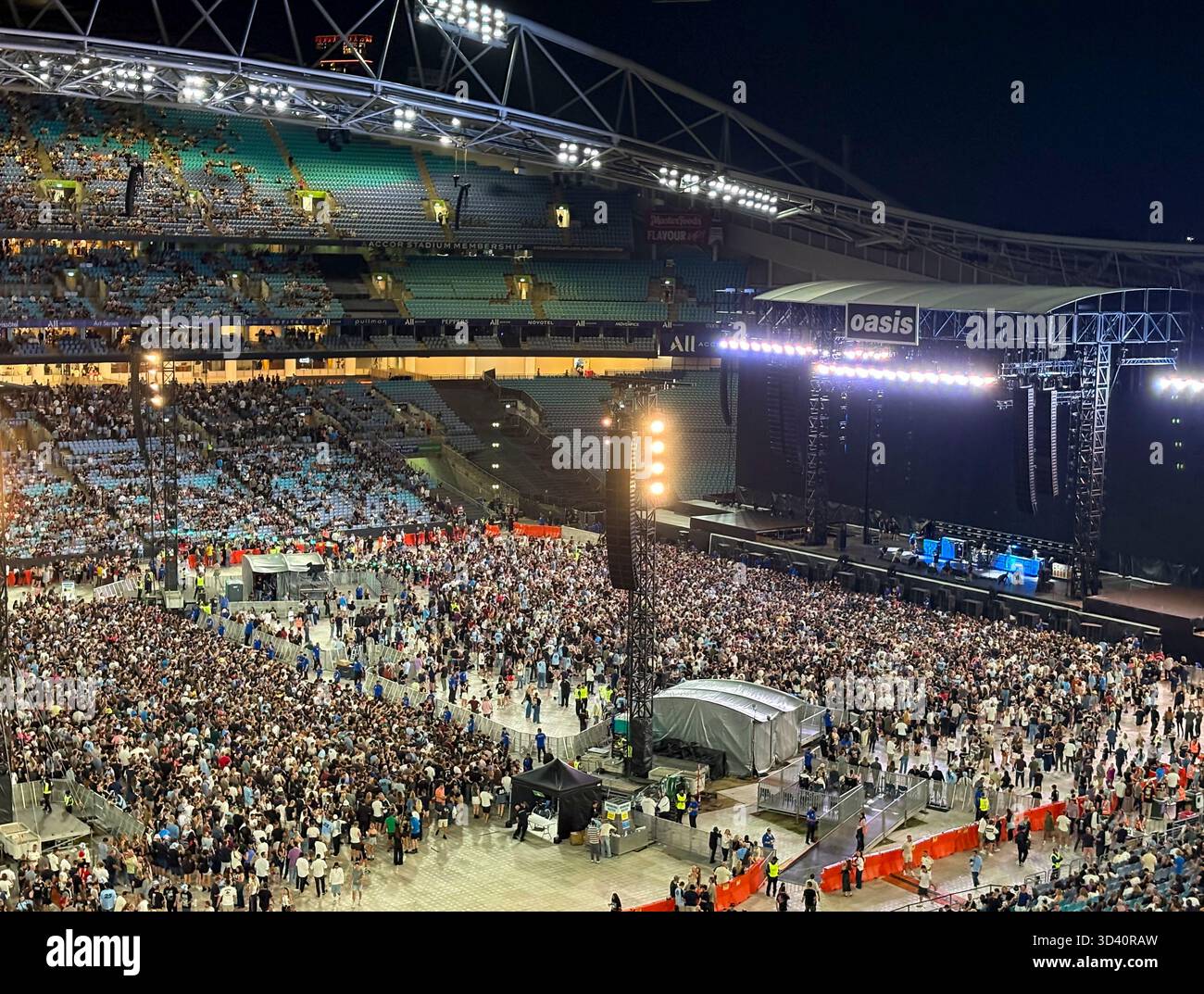 Oasis Live 25 tour, Accor Stadium Sydney, Oasis fans inside the stadium waiting for Oasis concert to begin, NSW, Australia - Smartphone Captured Stock Image