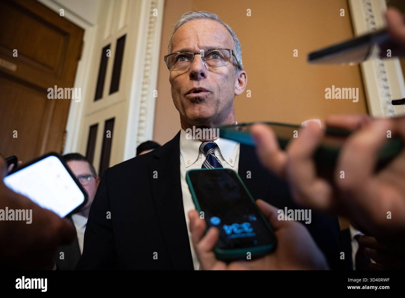 Senate Majority Leader John Thune (R-S.D.) speaks with reporters as he ...