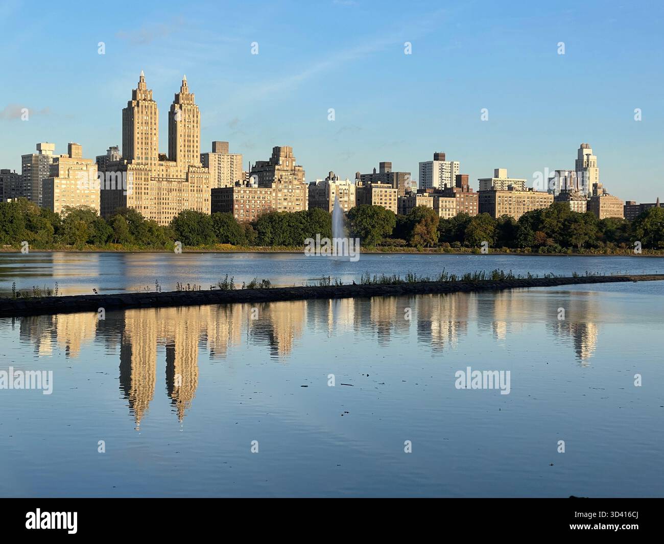 Central Park landscape with city skyline, showing seasonal changes. - Smartphone Captured Stock Image